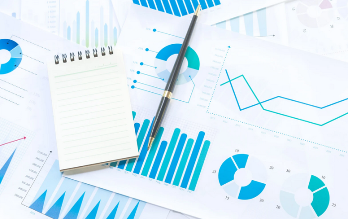 Charts and graphs showing SaaS financial models for startups.